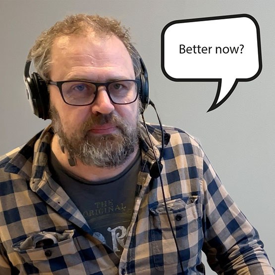 Therapist with headset on. Speech bubble that clearly says better now?